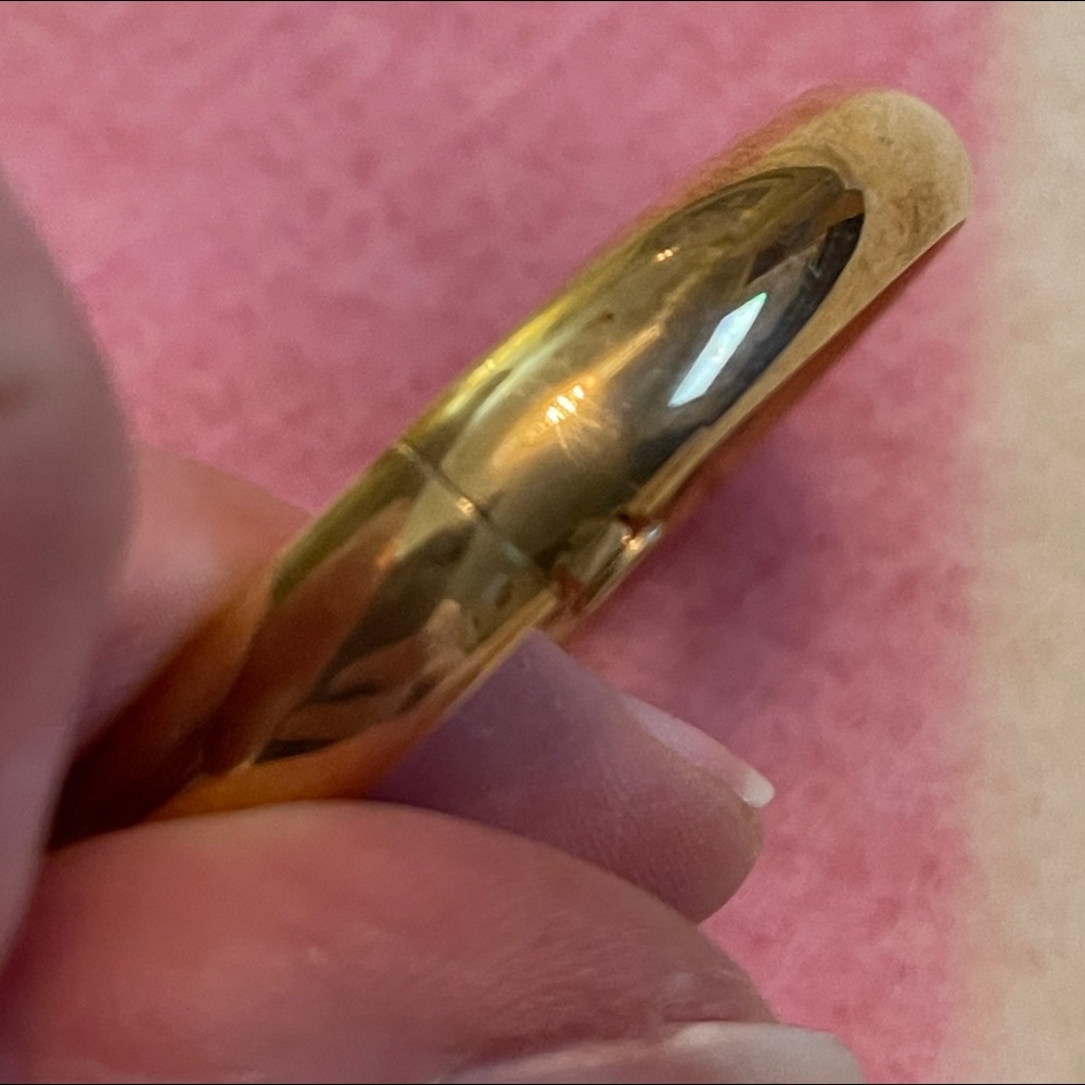 Gold bracelet with lock.